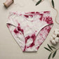 Tie-dye underwear with cotton and thread on a neutral background