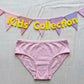 Pink underwear with a 'Kids' Collection' banner on a light gray background